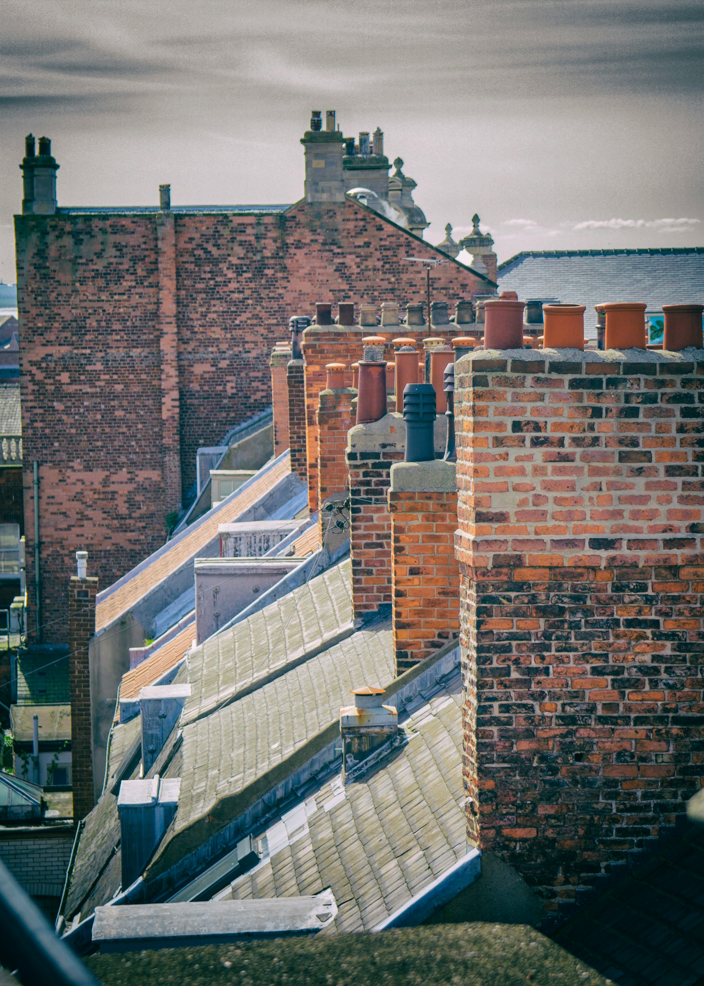 Brick rooftops and chimney stacks on Dorset terraced houses